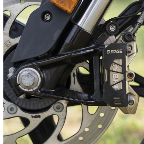 ZANA Front Disc Caliper Protector installed on BMW G310 GS front brake assembly